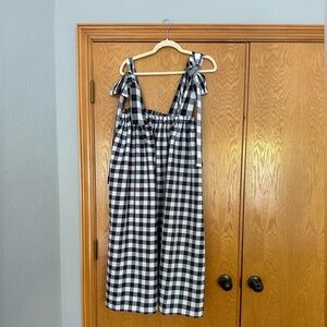 One of One Maya Meyer Gingham Dress
One Size Fits Most
Adjustable Tie Straps